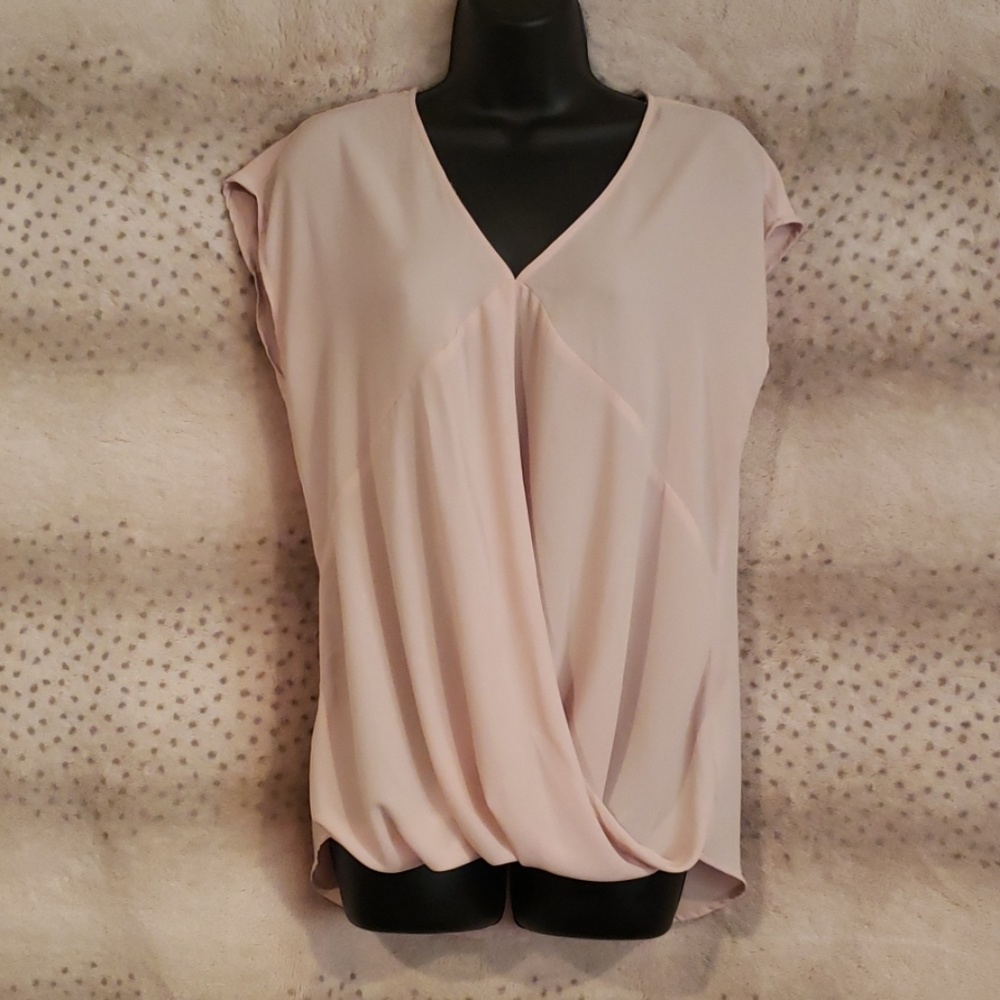 Very feminine, soft peach, v-neck, draped hem top